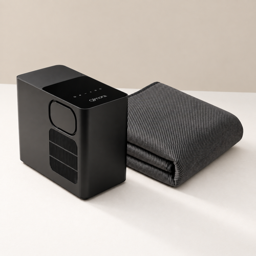 Qimora Sleep Core in Black: the bedside Unit next to the folded Pad